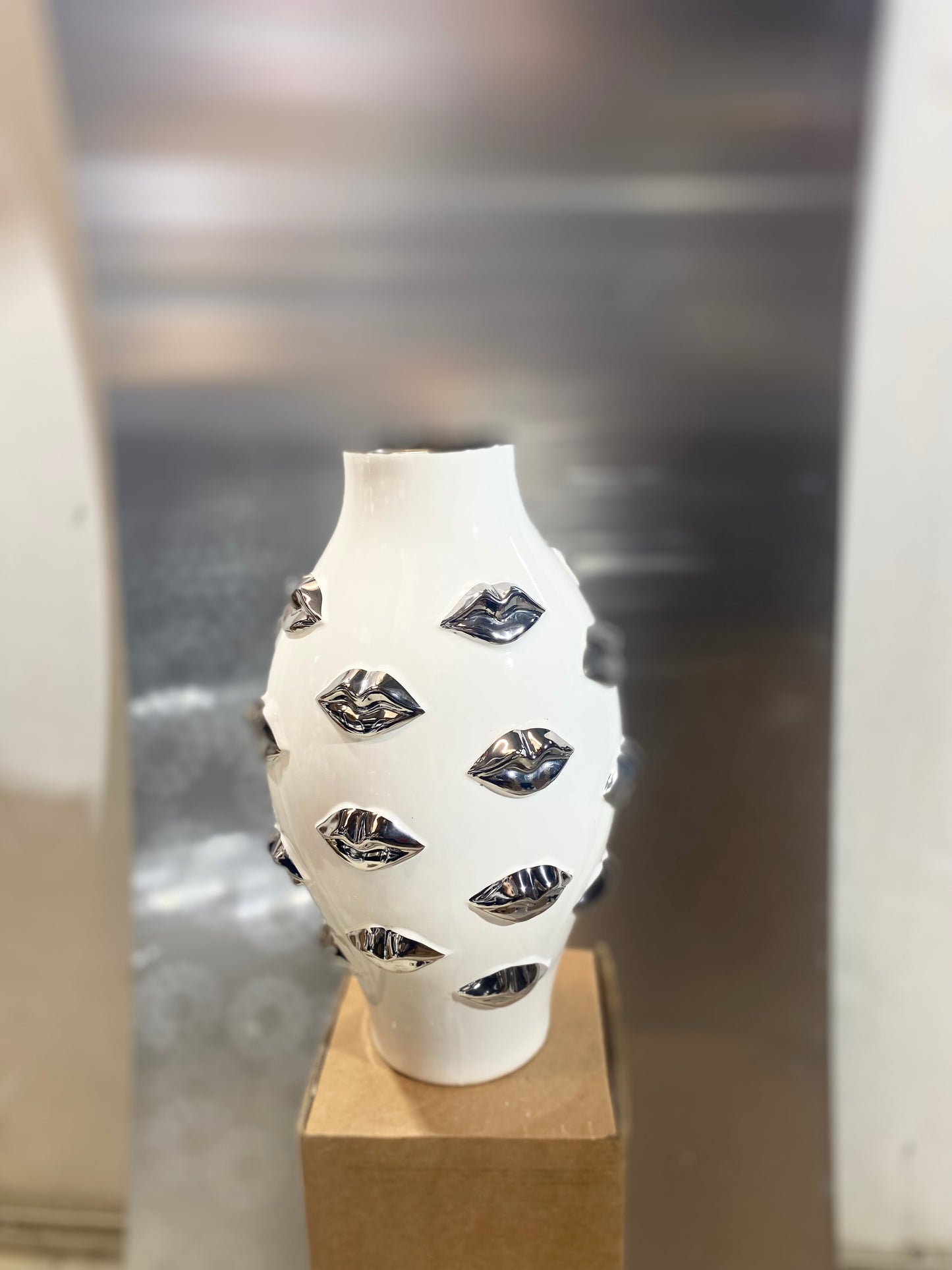 Silver kiss vase